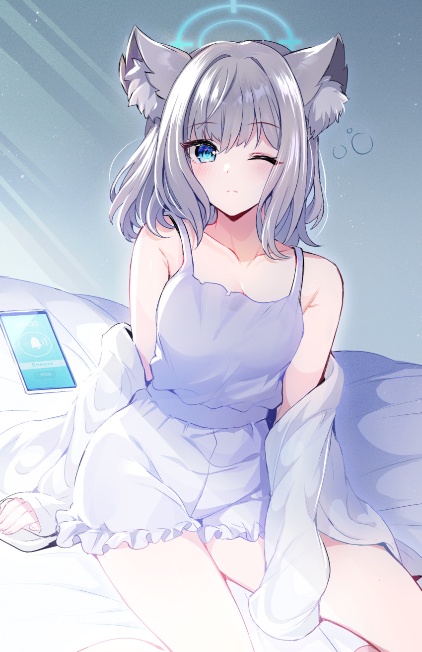 1girl animal_ear_fluff animal_ears blue_archive blue_eyes blush breasts camisole cellphone closed_mouth collarbone feet_out_of_frame frilled_shorts frills grey_hair halo highres long_sleeves looking_at_viewer off_shoulder on_bed one_eye_closed open_clothes open_shirt phone shiroko_(blue_archive) shirt short_hair shorts sitting sleeves_past_wrists smartphone solo squeans sunlight white_camisole white_shirt wolf_ears yozorasiba