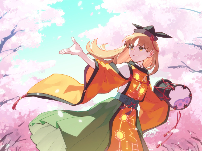 1girl blonde_hair cherry_blossoms commentary day drum hat highres holding holding_instrument instrument japanese_clothes long_hair matara_okina outdoors outstretched_arms shikido_(khf) skirt sky smile solo symbol-only_commentary tabard touhou wide_sleeves yellow_eyes