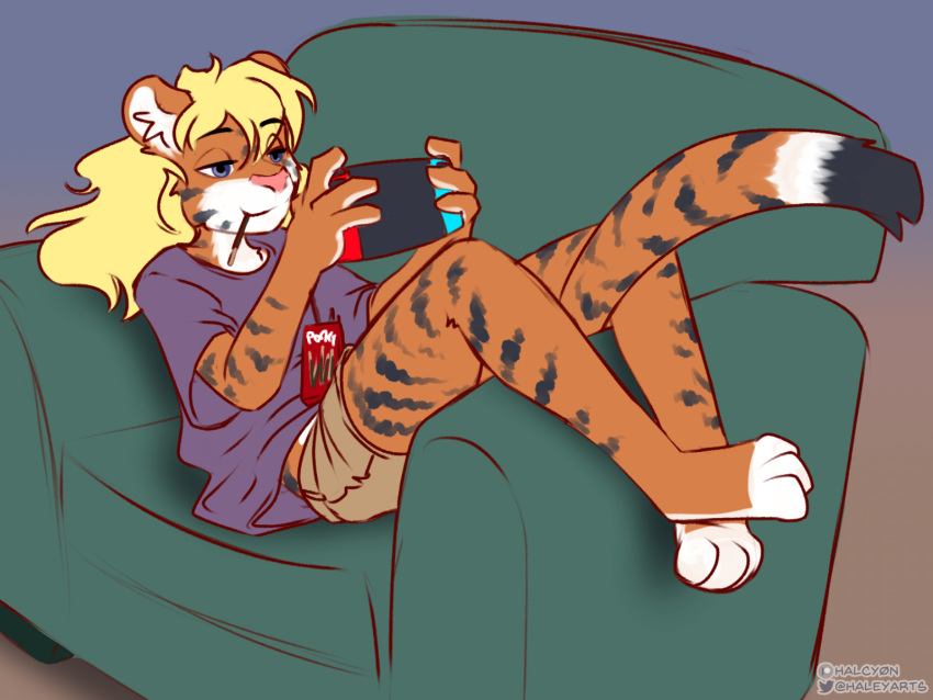 anthro barefoot blonde_hair bottomwear clothing feet felid female food food_in_mouth furniture hair halcy0n hi_res holding_nintendo_switch lying mammal pantherine pocky shirt shorts smile sofa solo striped_body stripes tiger topwear