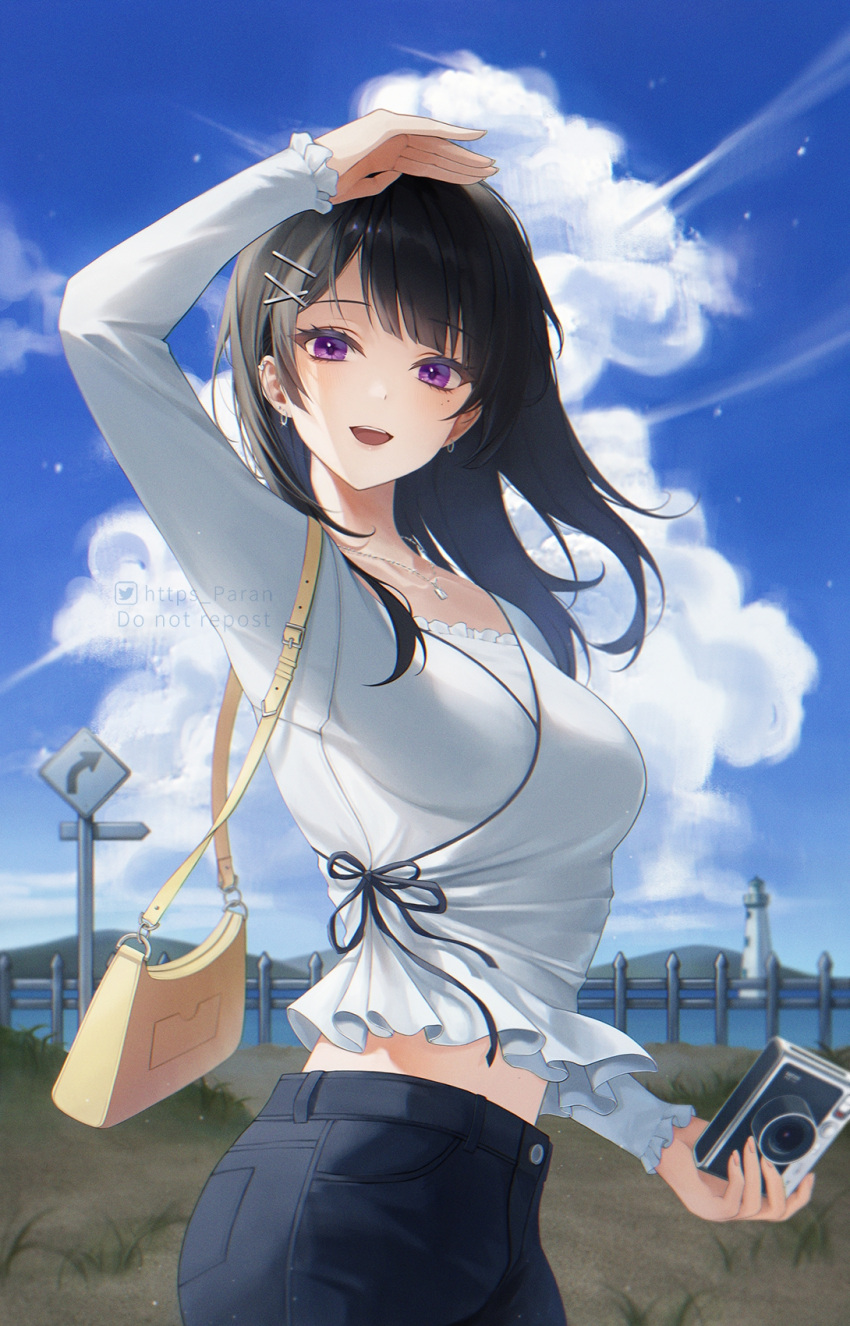 1girl :d arm_up bag bangs black_hair black_pants black_ribbon blue_sky blunt_bangs blush breasts camera cloud cowboy_shot day earrings eyebrows_visible_through_hair fence frilled_sleeves frills hair_ornament highres holding holding_camera jewelry large_breasts lighthouse long_hair long_sleeves looking_at_viewer midriff_peek mole mole_under_eye necklace open_mouth original outdoors pants paran purple_eyes ribbon road_sign shirt shoulder_bag sign sky smile symbol_in_eye white_shirt x_hair_ornament
