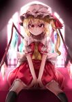  1girl absurdres ascot back_bow backlighting between_legs black_legwear blonde_hair bow closed_mouth collared_shirt commentary_request crystal eyebrows_visible_through_hair feet_out_of_frame flandre_scarlet frilled_shirt_collar frilled_skirt frilled_sleeves frills hair_between_eyes hand_between_legs hat hat_ribbon highres indoors looking_at_viewer maboroshi_mochi medium_hair mob_cap multicolored_wings orange_eyes puffy_short_sleeves puffy_sleeves red_ribbon red_skirt red_vest ribbon shiny shiny_hair shirt short_sleeves sitting skirt skirt_set smile solo thighhighs touhou vest white_headwear white_shirt window wings yellow_ascot 
