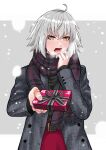  1girl absurdres ahoge alternate_costume bandaid bandaid_on_hand bangs black_sweater blush box coat cowboy_shot crossed_bangs fate/grand_order fate_(series) gift gift_box grey_coat grey_hair hair_between_eyes highres jeanne_d&#039;arc_alter_(fate) letterboxed looking_at_viewer medium_hair outside_border plaid plaid_scarf red_skirt scarf skirt snow solo sweater teeth tomotomow00w tongue valentine winter 