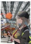  1girl absurdres apple_hair_ornament backpack bag baseball_cap black_hat black_shirt blue_hair border breasts brown_hair cellphone clothes_writing commentary_request eyelashes fingernails floating food-themed_hair_ornament glassy0302 hair_ornament hat highres holding holding_phone huge_breasts indoors kuraishi_ringo_(glassy0302) long_hair multicolored_hair open_mouth original phone photo_background pokemon pokemon_(creature) purple_eyes rotom rotom_(heat) shirt smartphone twitter_username two-tone_hair white_border 