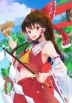  1girl ascot bow breasts brown_eyes brown_hair collared_vest commentary_request day detached_sleeves frilled_bow frills gohei hair_bow hakurei_reimu happy highres holding long_hair long_sleeves looking_at_viewer midriff miss_non navel ofuda open_mouth outdoors red_bow red_skirt skirt small_breasts solo stomach torii touhou tree vest white_sleeves wide_sleeves yellow_ascot 