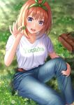  1girl :d akiyama0818 bag bangs blue_eyes blue_pants blurry blurry_background blush breasts brown_bag character_name clover collarbone denim eyebrows_behind_hair eyebrows_visible_through_hair four-leaf_clover go-toubun_no_hanayome grass green_ribbon hair_ribbon hand_on_own_knee highres holding looking_at_viewer medium_breasts medium_hair nakano_yotsuba on_grass on_ground open_mouth orange_hair outdoors pants ribbon shirt sitting smile solo sunlight white_shirt 