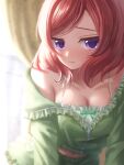  1girl blush breasts cleavage collarbone commentary green_pajamas highres large_breasts looking_at_viewer love_live! love_live!_school_idol_project nishikino_maki pajamas pipapip purple_eyes red_hair short_hair solo 