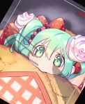  1girl bangs chibi crepe eating food fruit gradient_hair green_eyes green_hair hair_ornament hatsune_miku highres in_food minigirl multicolored_hair naimaze_atakamo recording solo strawberry taking_picture tearing_up thick_eyebrows twintails vocaloid wavy_eyes whipped_cream 
