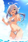  1girl ahoge alternate_costume asashimo_(kancolle) bare_arms bare_legs bare_shoulders bikini blue_sky blush breasts cloud cowboy_shot day double_v front-tie_bikini front-tie_top green_eyes grey_hair hair_over_one_eye highres kantai_collection long_hair looking_at_viewer medium_breasts navel one_eye_closed open_mouth outdoors ponytail sharp_teeth side-tie_bikini sky smile solo standing string_bikini swimsuit teeth v w wading water wet white_bikini yoshi_tama 
