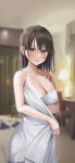  1girl blurry blurry_background breasts cleavage highres indoors large_breasts looking_at_viewer naked_towel original rouka_(akatyann) solo tan towel 