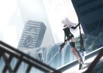 1girl android bare_shoulders black_gloves black_legwear blue_eyes breasts building dual_wielding elbow_gloves gloves highres holding holding_polearm holding_weapon housenail1 joints long_hair medium_breasts nier_(series) nier_automata polearm robot_joints ruins shorts solo spear thighhighs weapon white_hair yorha_type_a_no._2 