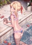  1girl absurdres ahoge bangs bingwei_huang blonde_hair blue_eyes blush bow breasts closed_mouth commentary cup elf eyebrows_visible_through_hair feet_out_of_frame food fruit hair_bow highres holding holding_cup leaf looking_at_viewer medium_hair original outdoors parted_bangs peach plant pointy_ears pool red_bow sidelocks small_breasts solo swimsuit tankard water wet 
