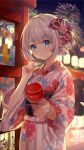  1girl aerial_fireworks bangs blue_eyes blurry blurry_background blush candy_apple closed_mouth commentary_request depth_of_field eyebrows_visible_through_hair fireworks floral_print food grey_hair highres hokuotzu holding holding_food indie_virtual_youtuber japanese_clothes kimono lantern long_sleeves looking_at_viewer night night_sky obi official_art outdoors paper_lantern print_kimono sash shizuku_lulu sky smile solo striped striped_kimono vertical-striped_kimono vertical_stripes virtual_youtuber wide_sleeves wind_chime 