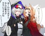  2girls animal_ears archetto_(arknights) arknights bangs bird_ears black_cape blue_eyes brown_hair cape closed_eyes commentary_request fingerless_gloves gloves goggles goggles_on_head grey_hair heterochromia highres hood hooded_cape kava long_hair looking_at_viewer mulberry_(arknights) multiple_girls open_mouth red_cape red_eyes smile sweatdrop translation_request whispering 