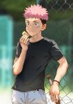  1boy baseball_bat beitemian black_shirt blurry blurry_background bracelet brown_eyes closed_mouth day eating facial_mark food food_on_face highres holding holding_food itadori_yuuji jewelry jujutsu_kaisen male_focus outdoors pants pink_hair shirt short_hair solo sweat undercut white_pants 