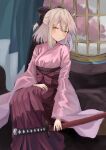  1girl absurdres ahoge black_bow blonde_hair bow breasts fate/grand_order fate_(series) hair_bow hakama half_updo highres japanese_clothes katana kimono kokoa_10701 medium_breasts okita_souji_(fate) okita_souji_(koha-ace) pink_kimono red_hakama scabbard sheath sheathed sitting solo sword weapon wide_sleeves yellow_eyes 