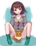  1girl bangs blush breasts brown_eyes brown_hair cable_knit cardigan cleavage collarbone commentary_request eevee eyelashes gloria_(pokemon) green_legwear grey_cardigan highres hooded_cardigan kutabireta_neko looking_at_viewer no_hat no_headwear plaid plaid_legwear pokemon pokemon_(creature) pokemon_(game) pokemon_swsh sitting socks spread_legs tongue tongue_out 