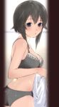  1girl bangs black_hair blush bra breasts cleavage cowboy_shot eyebrows_visible_through_hair grey_bra grey_eyes grey_panties hair_between_eyes hair_flaps hayasui_(kancolle) highres holding kantai_collection looking_at_viewer medium_breasts panties sakieko short_hair solo underwear underwear_only 