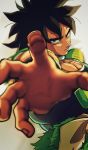  1boy armor black_eyes black_hair blurry broly_(dragon_ball_super) depth_of_field dragon_ball dragon_ball_super_broly expressionless fingernails frown grey_background highres looking_at_viewer male_focus outstretched_hand serious simple_background spiked_hair standing tama_azusa_hatsu twitter_username 