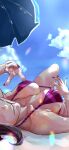  1girl bikini black_hair blue_sky bokkusu breasts clear_sky cleavage cloud fingernails han_juri head_out_of_frame highres knee_up light_particles lying nail_polish on_back parted_lips purple_bikini sky smile street_fighter striped striped_bikini swimsuit umbrella 