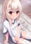  1girl bangs blush breasts buruma fate/kaleid_liner_prisma_illya fate_(series) grey_buruma gym_shirt hair_between_eyes illyasviel_von_einzbern long_hair looking_at_viewer name_tag pan_korokorosuke red_eyes shirt short_sleeves sidelocks sitting small_breasts smile solo sweat thighhighs thighs white_hair white_legwear white_shirt 