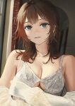  1girl bangs bra breasts brown_hair cleavage commentary_request fadingz green_eyes grey_bra highres light_particles light_smile long_hair looking_at_viewer medium_breasts mole mole_on_breast mole_under_eye off_shoulder original parted_lips signature solo underwear upper_body 
