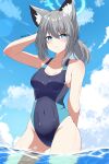  1girl animal_ear_fluff animal_ears bangs blue_archive blue_eyes blue_sky blue_swimsuit breasts cloud competition_swimsuit contrapposto cowboy_shot cross_hair_ornament grey_hair hair_ornament halo highres looking_at_viewer medium_breasts medium_hair mismatched_pupils one-piece_swimsuit reia_76 shiroko_(blue_archive) sky soaking_feet solo standing swimsuit water 