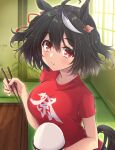  1girl ahoge alternate_costume black_hair bowl breakfast breasts chopsticks commentary_request eating food hair_between_eyes hair_ornament highres kitasan_black_(umamusume) looking_at_viewer medium_breasts red_eyes rice_bowl shirt sitting solo t-shirt table tokia_(17141031otw) umamusume 