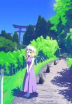  1girl black_cat blonde_hair blue_eyes blush bush cat closed_mouth commentary day dress eyebrows_behind_hair grass hat highres looking_at_viewer maribel_hearn medium_hair mob_cap nama_udon outdoors own_hands_together path pole purple_dress shoes sky solo standing torii touhou tree v_arms white_footwear white_headwear wide_shot 