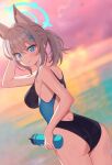  1girl animal_ear_fluff animal_ears ass bangs bare_arms blue_archive blue_eyes blurry blurry_background blush bottle breasts competition_swimsuit cowboy_shot cross_hair_ornament dutch_angle from_side grey_hair hair_ornament halo highres holding holding_bottle looking_at_viewer medium_breasts mismatched_pupils one-piece_swimsuit pn_(wnsl216) shiroko_(blue_archive) shiroko_(swimsuit)_(blue_archive) sidelocks smile solo swimsuit two-tone_swimsuit water_bottle wet 