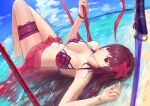  1girl bangs bare_shoulders beach bikini blue_sky bow_(weapon) bracelet breasts bridal_garter cleavage collarbone fate/grand_order fate_(series) flower gae_bolg_(fate) hair_between_eyes hair_flower hair_ornament hibiscus highres jewelry katana large_breasts long_hair looking_at_viewer lying navel ocean on_back polearm purple_bikini purple_hair red_eyes sarong scathach_(fate) scathach_(swimsuit_assassin)_(fate) shore sky solo spear swimsuit sword thighs weapon zonotaida 