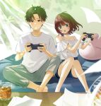  1boy 1girl :o absurdres bangs bangs_pinned_back barefoot blue_eyes blush brown_hair bunny_hair_ornament center_frills chips controller cup curtains dappled_sunlight denim denim_shorts drink electric_fan food food_in_mouth frills game_controller hair_ornament hands_up highres holding holding_controller holding_game_controller ice ice_cube indian_style knees_together_feet_apart light_rays medium_hair mouth_hold off-shoulder_shirt off_shoulder on_bed open_mouth original pants paper plant potato_chips shirt short_hair short_sleeves shorts sitting stuffed_animal stuffed_bunny stuffed_toy sunlight sweat t-shirt tasuku_(otomebotan) v-shaped_eyebrows 