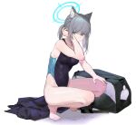  1girl animal_ear_fluff animal_ears bag bangs bare_arms bare_legs black_swimsuit blue_archive blue_eyes competition_swimsuit duffel_bag grey_hair hair_ornament halo highres looking_at_viewer medium_hair multicolored_clothes multicolored_swimsuit one-piece_swimsuit shiroko_(blue_archive) shiroko_(swimsuit)_(blue_archive) shiyashiki solo squatting swimsuit wet white_background 