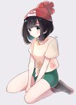  1girl bangs bare_legs beanie black_hair closed_mouth commentary_request eyelashes floral_print full_body green_shorts grey_background hat highres medium_hair pokemon pokemon_(game) pokemon_sm red_headwear selene_(pokemon) shirt shoes short_shorts short_sleeves shorts signature sitting sneakers solo swept_bangs t-shirt tere_asahi tied_shirt 