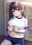  1girl :o bangs black_hair blue_shorts blush breasts clothes_lift commentary_request gym_shirt gym_shorts gym_uniform hair_between_eyes head_tilt highres indoors lifted_by_self looking_at_viewer medium_breasts minami_saki navel original parted_lips red_eyes shirt shirt_lift short_shorts short_sleeves shorts solo stomach white_shirt 