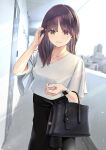  1girl adjusting_hair bag balcony bangs black_skirt blurry blurry_background blush brown_eyes brown_hair building chikuwa_(odennabe) city collarbone door hand_up handbag holding holding_bag jewelry long_hair looking_at_viewer necklace original shirt short_sleeves skirt smile solo standing watch white_shirt 