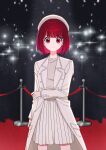  1girl absurdres arima_kana beret black_background bob_cut closed_mouth hat highres inverted_bob jacket light looking_at_viewer oshi_no_ko red_eyes red_hair shirt short_hair skirt solo white_headwear white_jacket white_shirt white_skirt xiang_yu_pai 