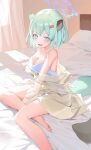  1girl absurdres animal_ears bare_legs bare_shoulders barefoot bed_sheet blue_archive blush breasts camisole cleavage collarbone commentary curtains green_hair halo highres indoors looking_at_viewer medium_breasts on_bed pillow shigure_(blue_archive) shirt short_hair sitting smile solo tail toes weasel_ears weasel_tail white_camisole window_shadow yellow_shirt yo_owl yokozuwari 