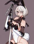  1girl 2b_(nier:automata) abottleofstars adapted_costume animal_ears black_thighhighs blue_eyes blush boots breasts cleavage commentary cropped_legs facing_viewer grey_hair holding holding_sword holding_weapon juliet_sleeves katana long_sleeves mole mole_under_mouth nier:automata nier_(series) playboy_bunny puffy_sleeves rabbit_ears rabbit_tail short_hair shrug_(clothing) simple_background sitting solo sword tail thigh_boots thighhighs weapon white_background 