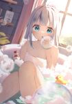 1girl bath bathing bathtub blue_eyes blue_hair bottle bubble commentary english_commentary flat_chest gawr_gura grey_hair highres holding holding_bottle hololive hololive_english indoors looking_at_viewer multicolored_hair naked_towel partially_submerged rubber_duck seboneko soap_bubbles solo towel virtual_youtuber water wet white_hair window 