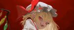  1girl blonde_hair crystal fang flandre_scarlet from_below hat highres looking_at_viewer medium_hair mob_cap open_mouth red_background red_eyes red_ribbon ribbon simple_background solo touhou zealh233 