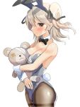  1girl alternate_costume animal_ears bandages bare_shoulders black_bow black_bowtie black_ribbon blaze_(artist) blonde_hair blush boko_(girls_und_panzer) bow bowtie breasts cleavage closed_mouth collarbone detached_collar fake_animal_ears from_side girls_und_panzer grey_eyes grey_leotard hair_ribbon highres holding holding_stuffed_toy leotard medium_breasts pantyhose rabbit_ears rabbit_tail ribbon shimada_arisu short_twintails simple_background solo stuffed_animal stuffed_toy tail teddy_bear thighband_pantyhose twintails white_background wrist_cuffs 