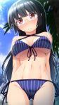  1girl absurdres alternate_costume bikini black_hair blue_bikini blue_sky breasts choukai_(kancolle) criss-cross_halter day from_below front-tie_bikini front-tie_top glasses halterneck highres kantai_collection large_breasts long_hair narashika_asuka navel outdoors palm_leaf red_eyes side-tie_bikini sky solo striped striped_bikini swimsuit vertical-striped_bikini vertical_stripes 