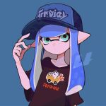  1girl baseball_cap black_shirt blue_background blue_hair blue_headwear commentary green_eyes hat imaikuy0 inkling inkling_girl inkling_player_character long_hair pointy_ears print_headwear print_shirt shirt simple_background solo splatoon_(series) symbol-only_commentary tentacle_hair upper_body 