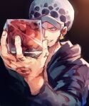  1boy aokamei black_coat black_hair blue_eyes coat facial_hair fingernails goatee grin highres holding_cube long_sideburns looking_at_viewer male_focus one_eye_covered one_piece resized short_hair sideburns smile solo trafalgar_law upper_body upscaled white_headwear 