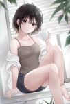 1girl bangs barefoot black_hair black_shorts brown_camisole camisole closed_mouth collarbone commentary_request cup highres holding holding_cup looking_at_viewer original purple_eyes shirt short_hair shorts sitting smile solo tsumugi_8345 white_shirt 