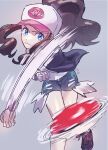  1girl baseball_cap black_boots black_vest blue_eyes boots brown_hair clenched_hand closed_mouth commentary_request enamo_(dcah) exposed_pocket grey_background hat highres hilda_(pokemon) long_hair motion_blur poke_ball poke_ball_(basic) pokemon pokemon_black_and_white shirt shorts sidelocks solo throwing vest white_hat white_shirt wristband 