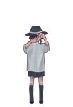 1girl black_hair black_hat black_skirt black_socks blue_bow bow commentary covered_mouth finger_frame hair_bow hair_over_one_eye hat highres shirt short_hair short_sleeves simple_background skirt socks solo standing touhou uewtsol usami_renko white_background white_shirt 