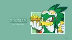  1boy absurdres blue_eyes character_name copyright_notice furry furry_male glasses gloves goggles goggles_on_head gold green_background green_theme hawk_boy highres holding jet_the_hawk male_focus official_art official_wallpaper simple_background solo sonic_(series) sonic_channel spectacles upper_body white_gloves 
