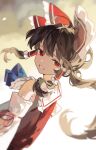  1girl absurdres ascot blue_ascot bow brown_hair clynxen commentary detached_sleeves frilled_bow frilled_hair_tubes frills from_behind grin hair_bow hair_tubes hakurei_reimu highres long_hair looking_at_viewer looking_back red_bow red_eyes red_vest smile solo touhou upper_body vest white_sleeves 