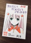  1girl 2018 commentary_request green_eyes hair_ornament hatching_(texture) highres lumi_(parallel_paradise) marker_(medium) okamoto_lynn parallel_paradise photo_(medium) pink_hair portrait smile solo sphere_hair_ornament straight-on traditional_media translation_request 